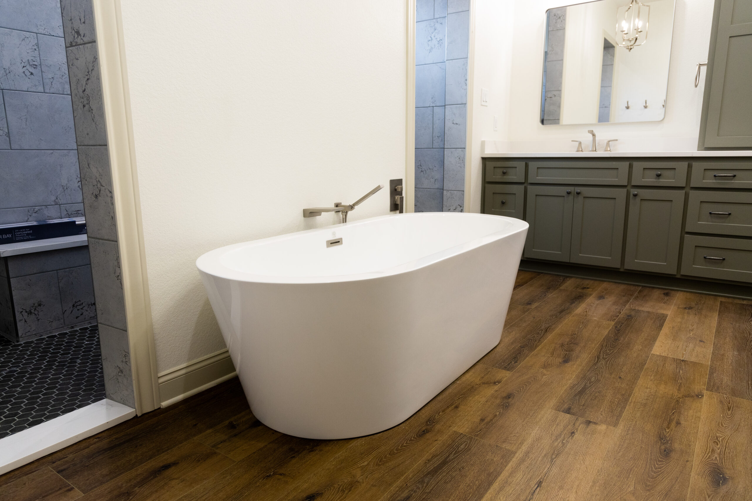 Modern bathroom remodel featuring a sleek tub and dual sinks by Waco Bathroom Remodel near me