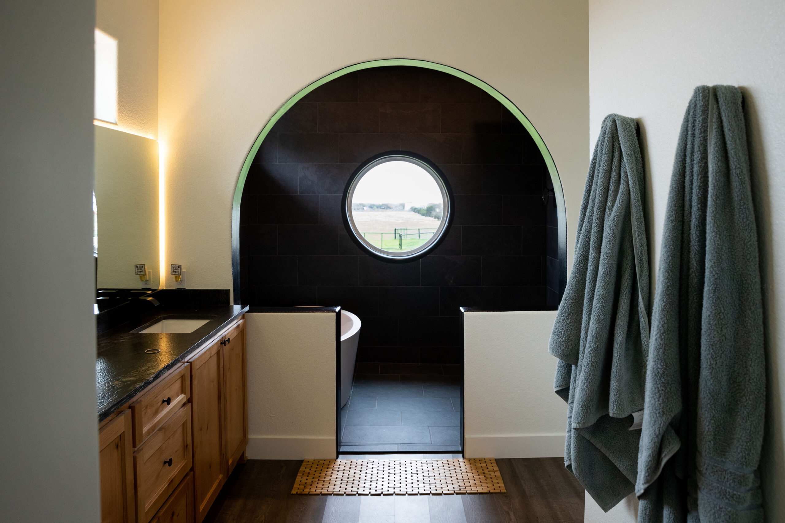 Modern bathroom remodel featuring a sleek tub and dual sinks by Waco Bathroom Remodel near me