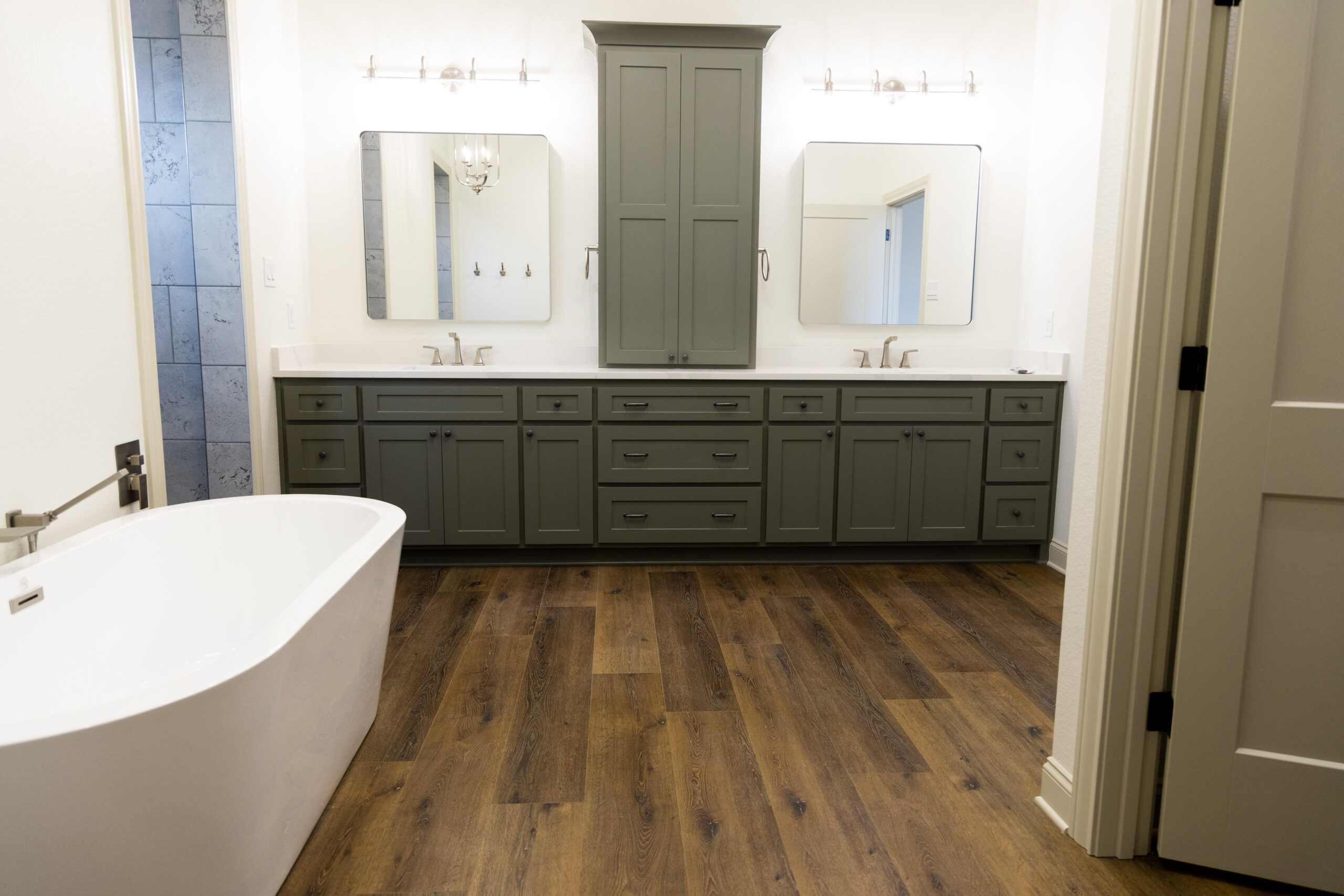 Modern bathroom remodel featuring a sleek tub and dual sinks by Waco Bathroom Remodel near me